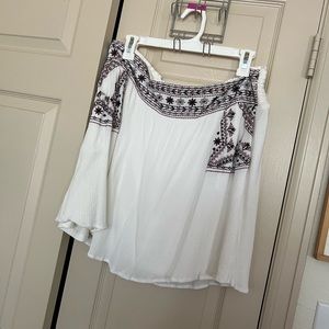 Xhilaration white gauze skirt with embroidered detail at waist.